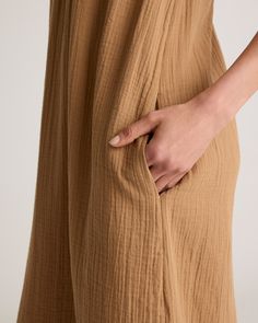 Our 100% Organic Cotton Gauze Sleeveless Maxi Dress is perfect for hot summer days, beach vacations, or evening strolls. With its elegant maxi length and high neck design, this dress ensures you'll look polished and put-together for any occasion. Made of breezy, lightweight organic cotton gauze, this dress will keep you cool all summer long!  | Quince | Women's Gauze Sleeveless Maxi Dress in Toasted Coconut, Size Large, Organic Cotton Look Polished, High Neck Designs, Jenni Kayne, Warm Weather Outfits, Beach Vacations, Toasted Coconut, Organic Fabrics, Sleeveless Maxi Dress, Wide Leg Jumpsuit