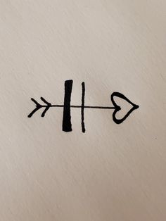 an arrow is drawn on the side of a piece of paper