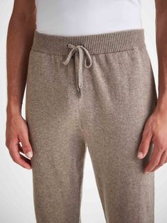 The Finley track pant is perfect in and out of the house, whether you're hitting the slopes, on a country walk or chilling on the sofa. With its elasticated waist, drawstring tie and slip-in side pockets, the aim was to create a garment that looks effortlessly chic but is still as comfortable to slip into as a favourite tracksuit. Our Finley mole heather men's cashmere track pants have a gradual taper to the leg and a ribbed waistband and ankle cuffs, for a relaxed yet stylish fit. Our philosoph Womens Bathrobes, Silk Pajamas Women, Comfortable Loungewear, Cashmere Pants, Womens Pajama Shorts, Personalized Pajamas, Country Walk, Pyjamas Womens, Short Loungewear