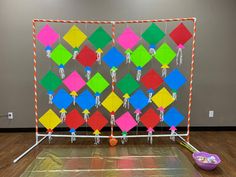 an art installation with colorful kites on display