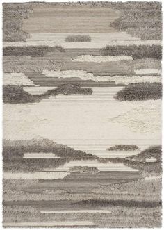 an area rug with clouds and trees on the ground in grey, beige and white colors