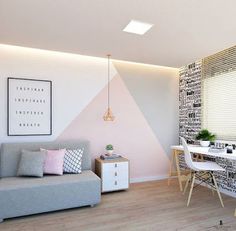 a living room filled with furniture next to a wall mounted art piece on the wall