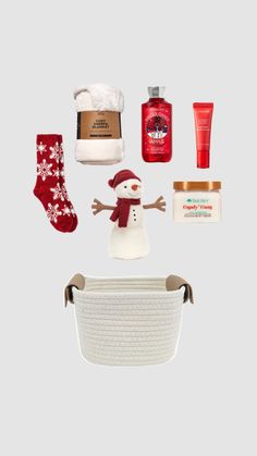 the contents of a christmas gift set including socks, soaps and body lotion