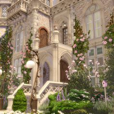 a large white building with lots of flowers on it