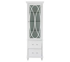 a white china cabinet with glass doors on the front and drawers in the bottom section