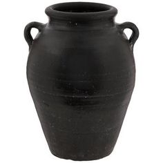 a black vase with handles is shown on a white background