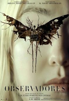 a movie poster with a woman's face in the center and a bat on her head