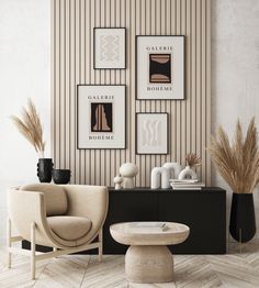 a living room filled with furniture and pictures on the wall next to a coffee table