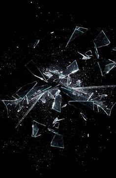 broken glass on black background with space for text