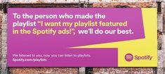 a sign on the side of a building that says, to the person who made the playlist i want my playlist featured in the spoty ads we'll do our best