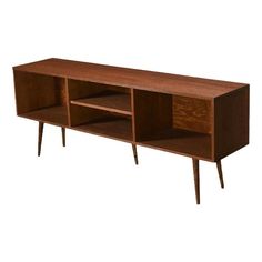 the sideboard is made out of wood and has two open compartments on each side