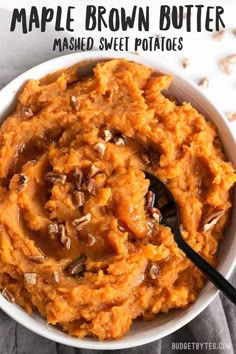 a white bowl filled with mashed sweet potatoes