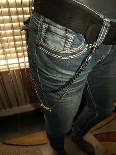 One link chain is black with silver cuts, the other is a ball chain with six charms that rest in the middle of the chain while wearing. Can be used to secure wallet and keys or as a pant or jean accessory. Chain Pants, Pant Chains, Le Port, Jean Accessories, Wallet Chain, Black And Silver, Ball Chain, Link Chain, Purse Wallet