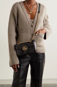 Black GG Marmont quilted leather shoulder bag | Gucci | NET-A-PORTER Gucci Bag Outfit, Gucci Marmont Mini, Gg Marmont Bag, Shoulder Bag Outfit, Gucci Gg Marmont Matelasse, Gucci Marmont Bag, Gucci Crossbody Bag, Gucci Purse, Gucci Crossbody