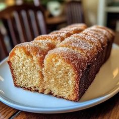 two pieces of cake on a white plate