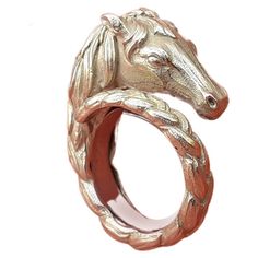 Exceptional and Gorgeous Authentic Hermès Ring In the shape of a horse's head, the braided gold mane forming the ring Vintage item Made of Yellow Gold 18K "HERMES PARIS" and Serial Number engraved inside Size: 50 EU / 5.5 US Measurements: - 16 mm INSIDE Diameter (0,63 inch) - 50,24 mm INSIDE Circumference (1,98 inch) - Horse head is 1 cm high (0,39 inch) Weight: 12,9 grams Condition: Excellent. Original Shape. No structural issue. Gold is clean. Would make a great gift ! Will come in a vintage H Hermes Ring, Horse Ring, Kelly Bag, Vintage Hermes, Hermes Paris, Horse Head, Jewelry Inspo, Ring Vintage, Yellow Gold Rings