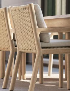 the chairs are lined up on the sidewalk