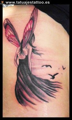 the back of a woman's stomach with a tattoo design on it, depicting a fairy