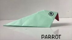 an origami bird with the word parrot on it