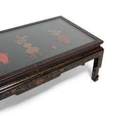 During winter in the colder provinces of China, life revolved around the kang, a heated brick platform that household members would sit or recline upon. Placed on top of the kang, low tables provided a convenient surface for dining, drinking tea, or playing games.  This early 20th-century kang table is elaborately decorated on all sides with painted floral scrollwork and geometric meanders. The top is decorated with finely carved stone and lacquer inlay of ancient bronzes, scholars' objects, and Stone Inlay, Low Tables, Art Furniture, Stone Carving, Early 20th Century, Drinking Tea, Asian Art, Games To Play, Furniture Makeover