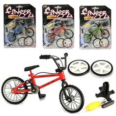 three different types of toy bikes with wheels and spokes on the front, one is red