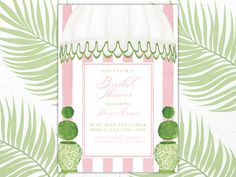 a pink and green bridal shower with palm leaves on the side, in front of a