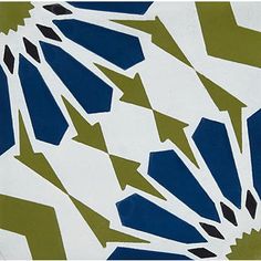 an artistic tile design with arrows in blue, green and white