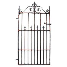 an old iron gate is shown against a white background