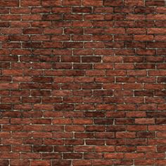 a brown brick wall that is very close up