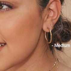 X-Small (13mm) Small (18mm) Medium (28mm) Large (34mm) Round tube hoop earrings Hinge-loop closures for comfortable and secure wear. 2025 Goals, Tube Hoop Earrings, Loop Earrings, Local Artisans, Ring Bracelet, Gift Item, Jewelry Crafts, Solid Gold, Gold Filled