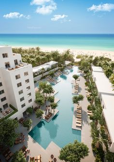 an aerial view of the resort and pool area