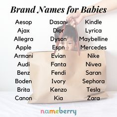 a person holding a brown bag with names for babies on it and the words in different languages