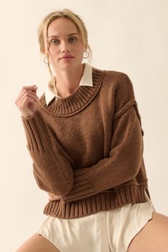 Solid knit sweater. Oversized rib-knit collar, cuffs, and hem. Exposed-seam detailing throughout. Round neckline. Long sleeves. Drop shoulder. Side-split hem. Relaxed fit. 78% Acrylic, 14% Nylon, 8% Polyester. Imported. Designed in LA. Model wears size S. Winter Layering Cropped Sweater With Ribbed Collar, Winter Cropped Sweater With Ribbed Collar For Layering, Cropped Sweater With Ribbed Collar For Winter Layering, Oversized Knit Cropped Sweater With Ribbed Collar, Oversized Cozy Cropped Sweater With Ribbed Collar, Cozy Oversized Cropped Sweater With Ribbed Collar, Fall Cropped Knit Sweater With Ribbed Collar, Knit Cropped Sweater With Ribbed Collar For Fall, Oversized Brown Sweater With Ribbed Collar