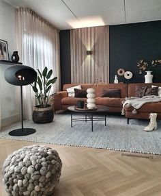 a living room filled with lots of furniture and decor