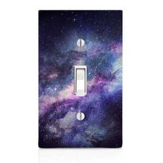 a light switch cover with an image of the night sky in purple and blue colors