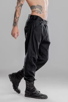 "These black casual pants for men are definitely the trendiest street style item of recent years. The cotton trousers are ideal for an every day normal wearing in combination with sports shoes or sneakers. These joggers are gothic and cyberpunk style clothing. Also, comfortable for yoga, fitness or the other sports activities. For other men's pants see: https://etsy.me/308eeDq FABRIC Material: cotton 100%. SIZES S, M, L, XL, XXL, XXXL MODEL INFO: Model is M size, 6.1\"\" tall (185 cm). S / EURO Gothic Plus Size, Cyberpunk Pants, Urban People, Cyberpunk Clothes, Black Cotton Fabric, Cyberpunk Fashion, Black Pants Casual, Trendy Street Style, Punk Outfits