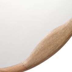 a close up of a baseball bat on a white background with a reflection in the mirror