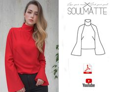 a woman wearing a red top and black pants with the words soulmatete on it