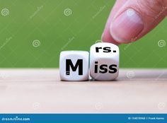 two dices with the words ms and r on them