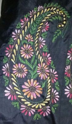 an embroidered jacket with flowers on it