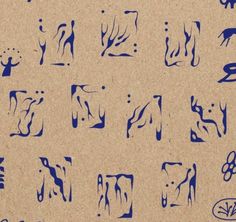 an image of some type of blue ink on brown paper with different shapes and sizes