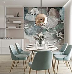 a dining room table with blue chairs and a large wall mural in the back ground