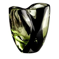 a black and green vase sitting on top of a table