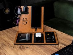 an electronic device is sitting on a wooden stand