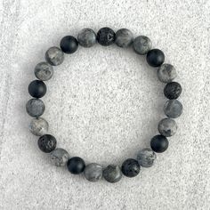 Men's beaded bracelet includes: ~ 8mm or 10mm Matte Black Labradorite beads ~ 8mm or 10mm Matte Onyx beads ~ 8mm or 10mm Black Lava beads ~ Stretchy cord; simply slide bracelet on and off wrist ~ Comes packaged in a re-usable microfiber pouch To ensure the perfect fit, please use the bracelet sizing instructions found in the photo gallery. Boy Bracelets, Male Bracelets, Boys Bracelet, Beads Bracelet For Men, Beaded Bracelets For Men, Beaded Bracelet For Men, Mcu Dr, Mens Bracelet Black, Boys Bracelets