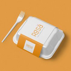 a plastic container with a fork next to it on an orange background that says pass