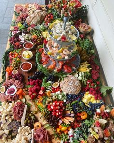 a table filled with lots of different types of food