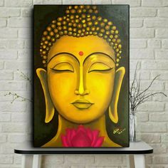 a painting of a buddha face with a flower in the foreground and a brick wall behind it