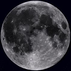 the full moon is shown in black and white