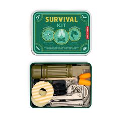 an open survival kit in a tin with scissors and other items